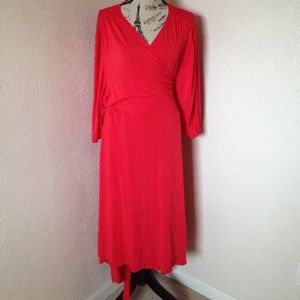 Kiyonna melon colored wrap dress