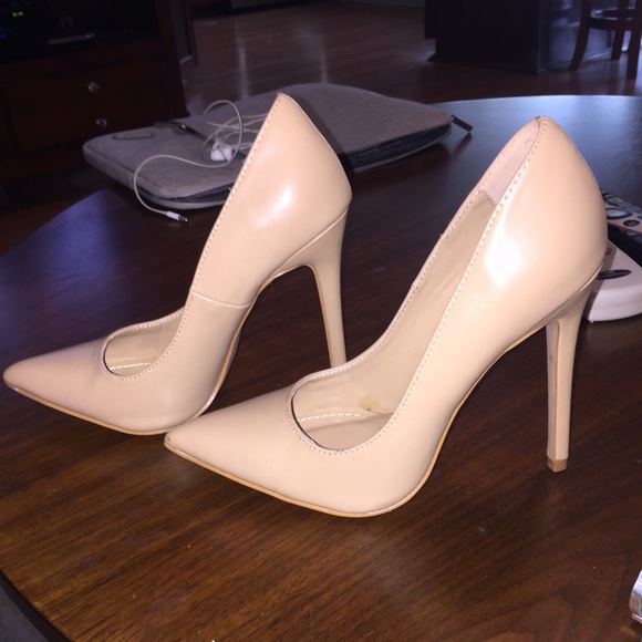 Nude pumps.