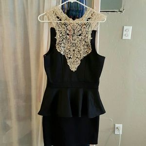 Black peplum figure flattering dress