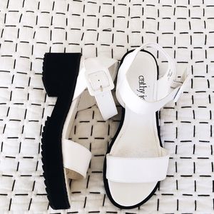 White strapped platforms.