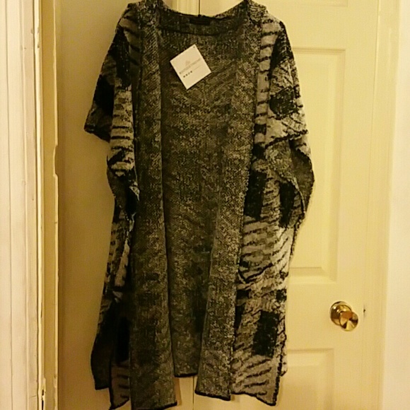 Black & white Mogley Cardigan. NEVER BEEN WORN!!