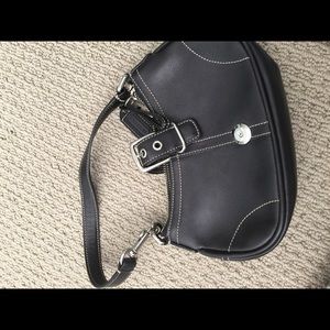 Coach, black leather purse.