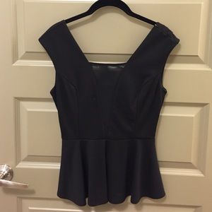 Black with sheer in the front, zip up pendulum top