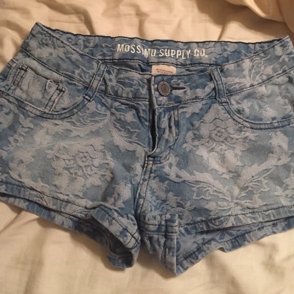 Mossimo Supply Co. Pants - Light blue faded jeans with flower print
