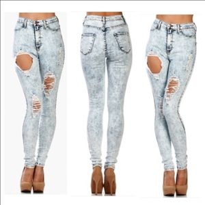 High waisted acid wash distressed denim jeans