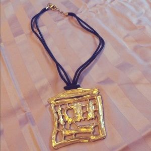 Gold medallion necklace