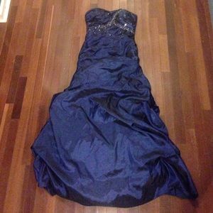 Blue ball gown with corset back.