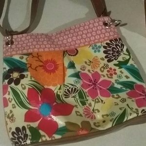 LOVE THIS fun, colorful PURSE!!! Adjustable strap.