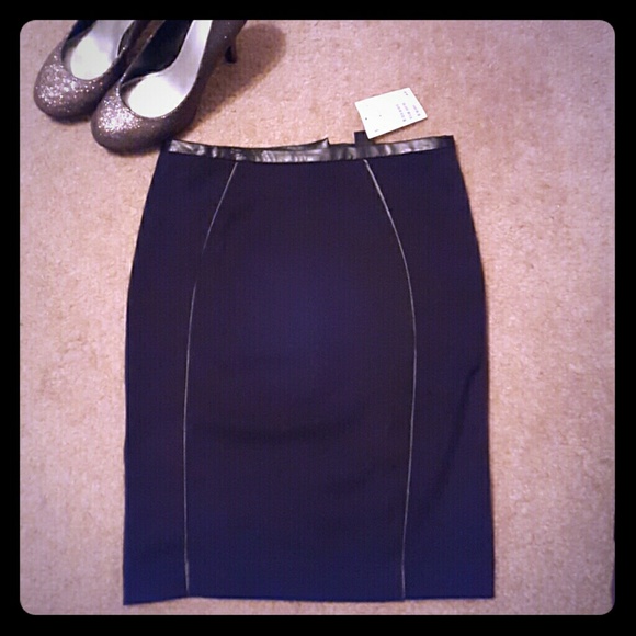 Faux leather lined black skirt... Never worn!