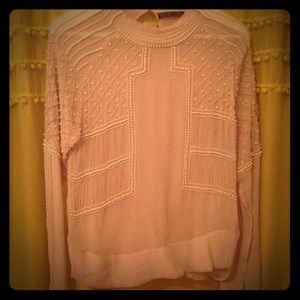 Pearl and bead-embroidered blouse