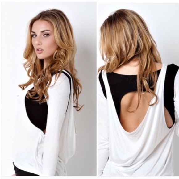 White and black long sleeve top with open back