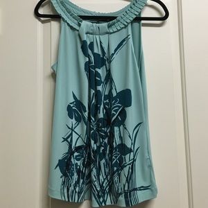 Cute neckline sleeveless blouse