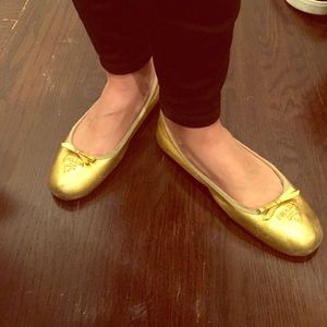 Gold Prada shoes