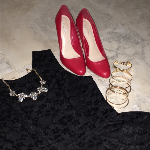 Used. ALDO Red Pumps