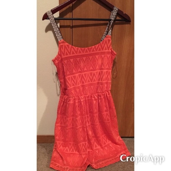 Orange tribal dress.
