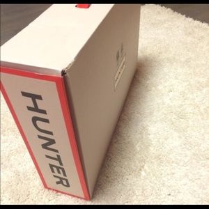 Glossy black hunter boots