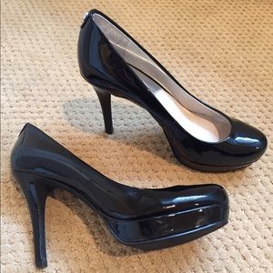 Michael Kors black patent pumps