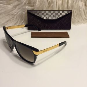 GUCCI *RARE* black sunglasses with gold detail