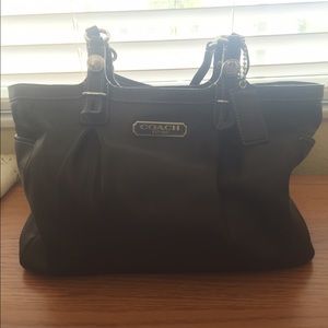 Brown leather Coach purse.