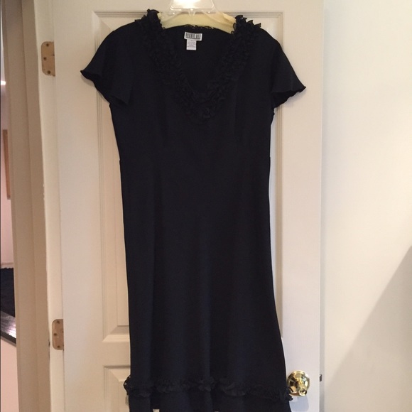 Black cocktail length crepe knee length dress