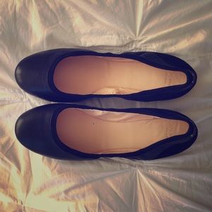 Cole Haan black leather and suede flats, size 10