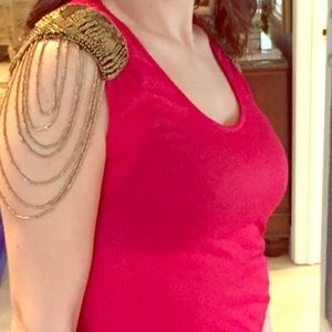 Festive red sleeveless top with beaded shoulders