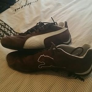 Brown puma shoes