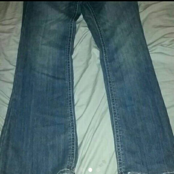 Light Faded Out Jean's with Design on the Pockets - Picture 2 of 4
