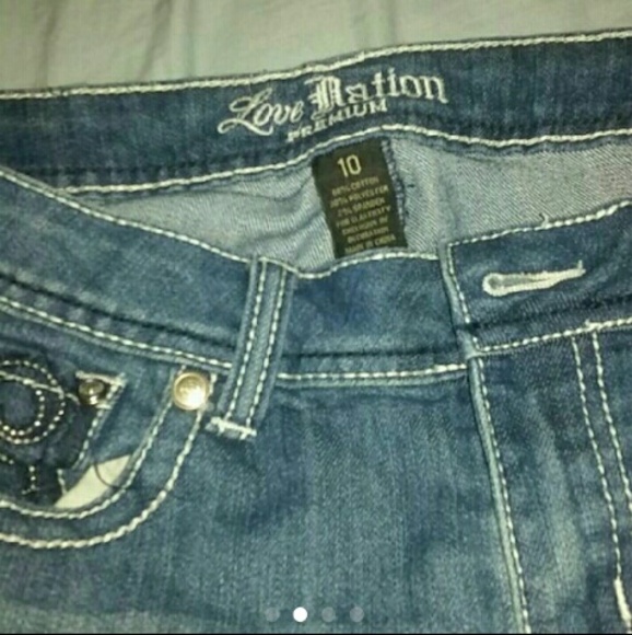 Light Faded Out Jean's with Design on the Pockets - Picture 4 of 4