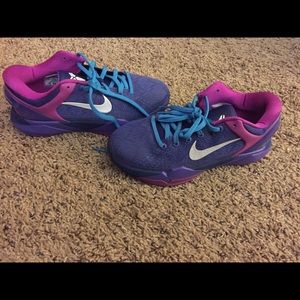 purple and pink Kobe shoes