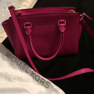 Pink Michael Kors Purse.