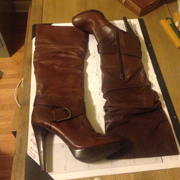 Heel knee high boots