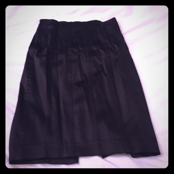 Black knee length skirt.