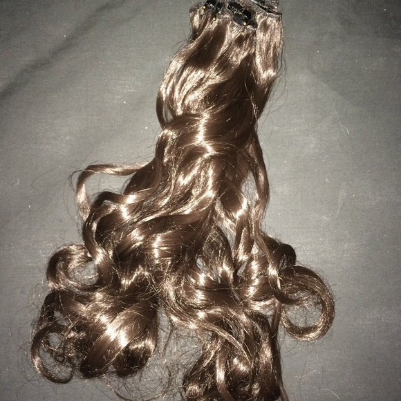 Dark brown synthetic hair extensions