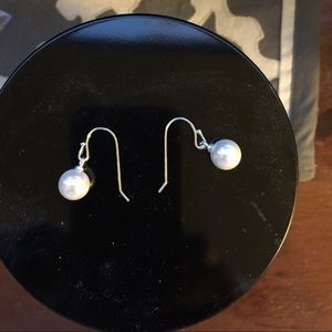 Never worn, pearl earrings.
