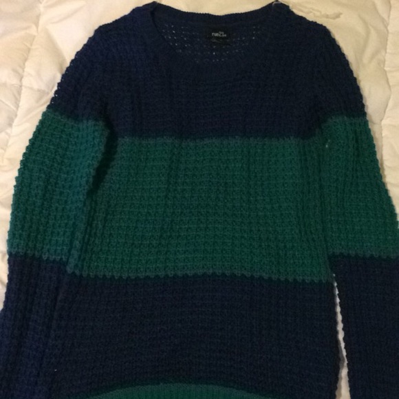 Green and blue striped sweater