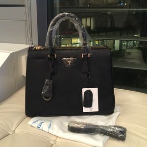 Black bag with gold details.