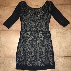 Black lace dress with a nude lining