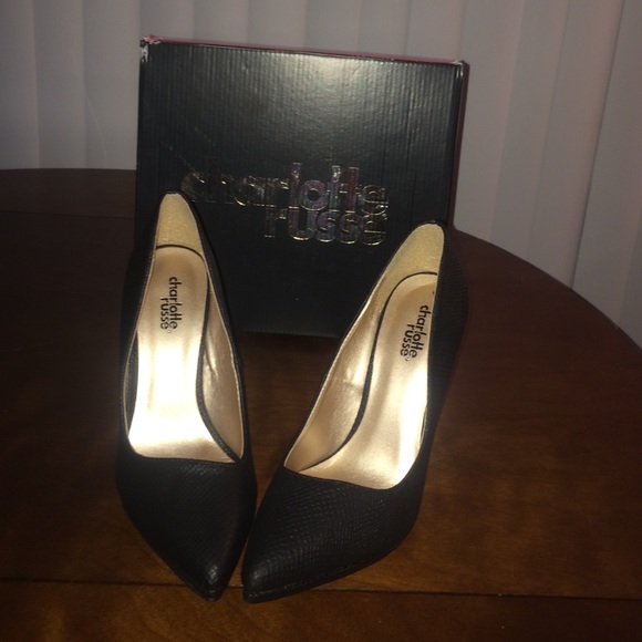 Never been worn.  black stiletto. Size 6