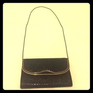 Evening clutch with gold accents