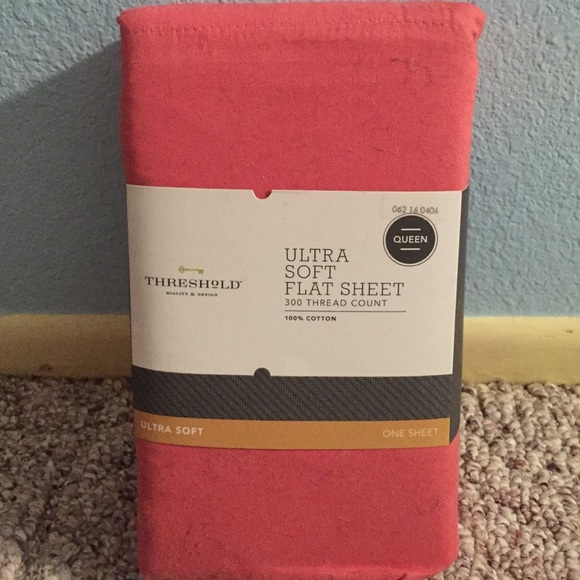 Never opened coral Queen sized sheets