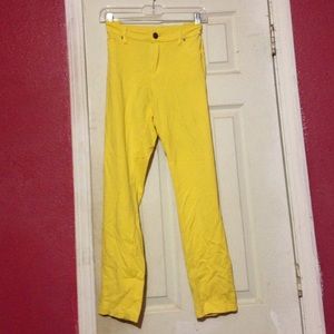 Bright yellow skinny leg pants