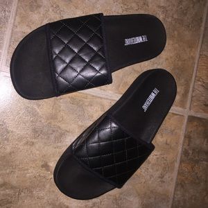 Black quilted slide ins.