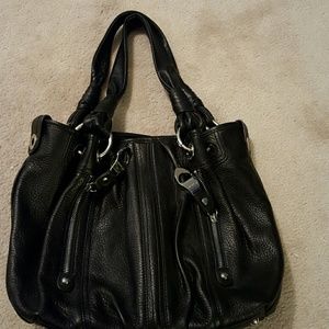 B . makowsky black leather bag.