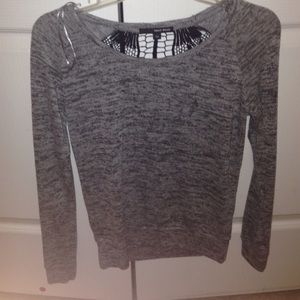 grey and white salt and pepper like sweater