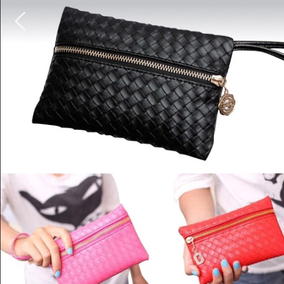 Red in color wristlet/clutch
