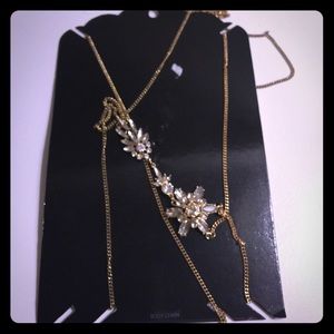 Gold body chain..