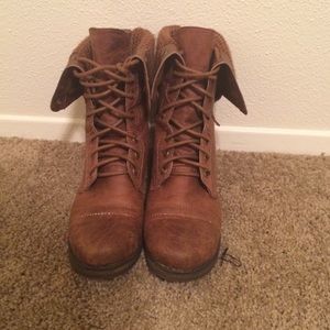 Brown bottom down boots.