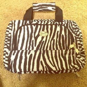 Zebra print travel bag.