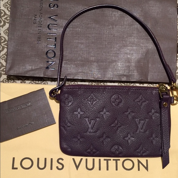Louis Vuitton Monogram Empreinte clutch/wristlet